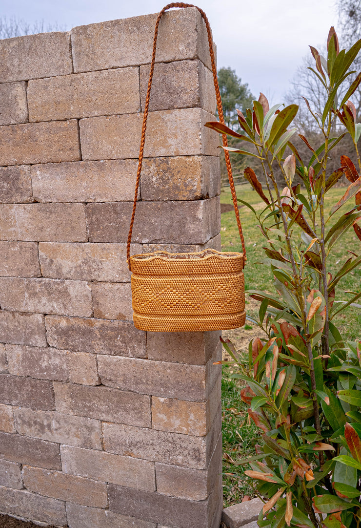 ANTONIA RATTAN HANDBAG WITH BRAIDED LEATHER STRAP