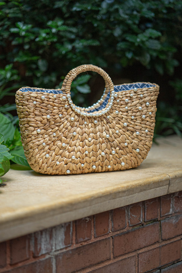 JOSIE PEARL AND WICKER HANDBAG